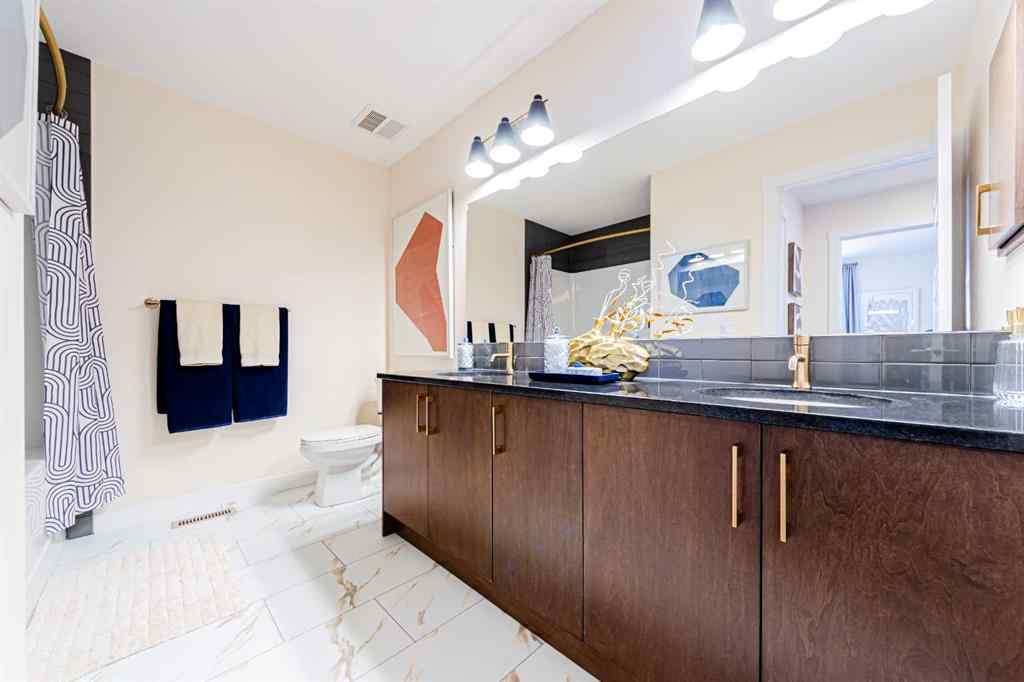 MLS® A2235359 - 711 Buffaloberry Manor SE in NONE Calgary, Residential