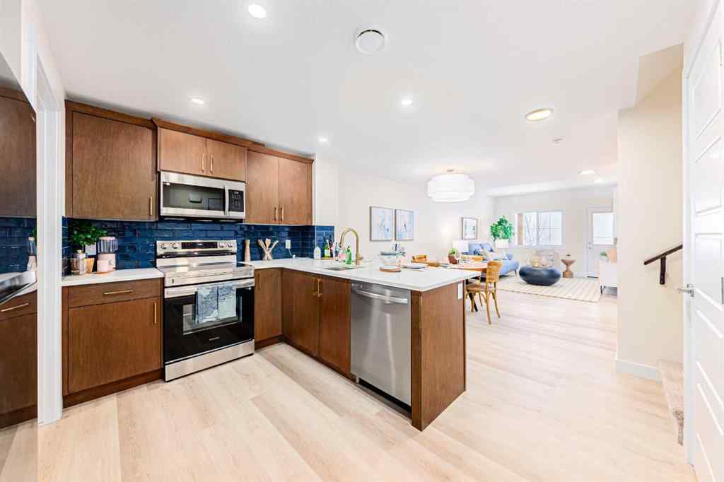 MLS® A2235359 - 711 Buffaloberry Manor SE in NONE Calgary, Residential