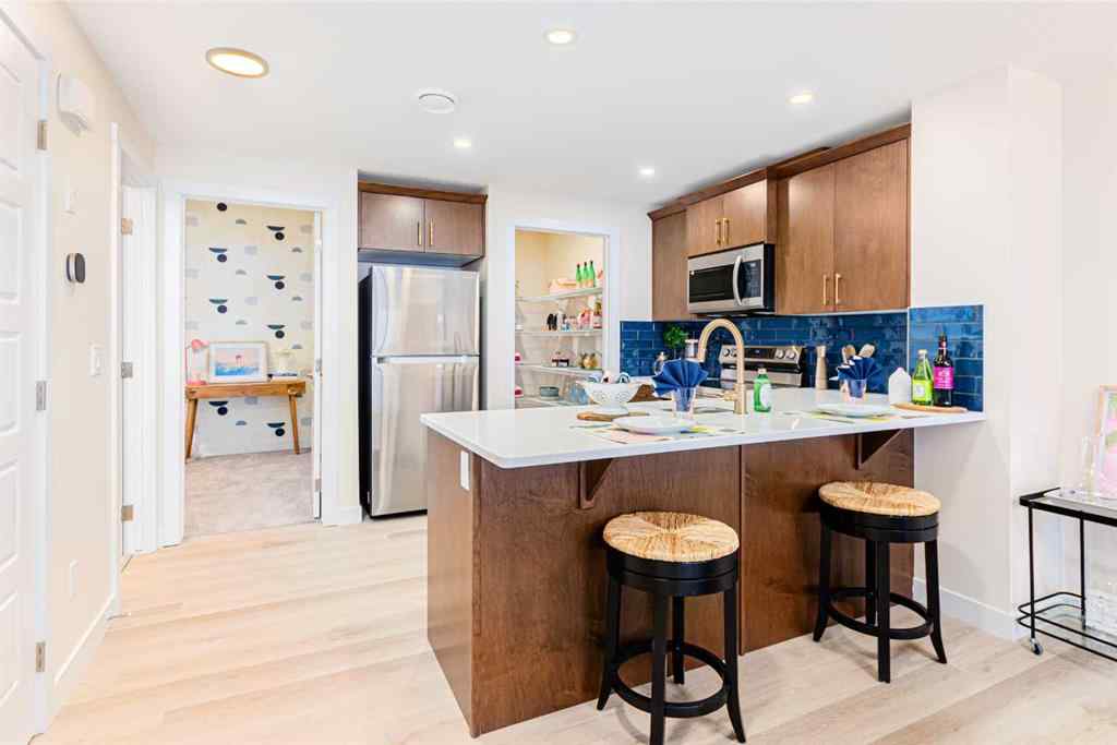 MLS® A2235359 - 711 Buffaloberry Manor SE in NONE Calgary, Residential