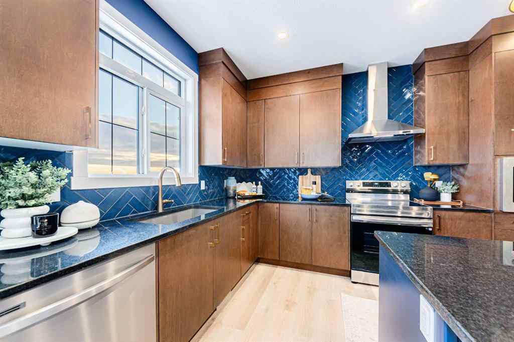 MLS® A2235359 - 711 Buffaloberry Manor SE in NONE Calgary, Residential
