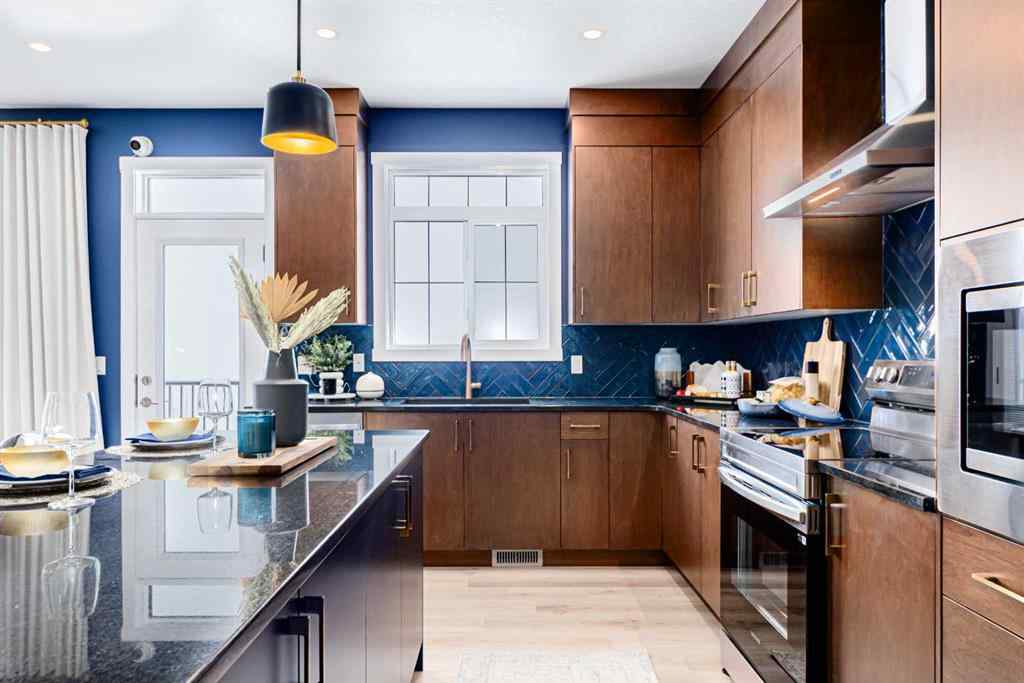 MLS® A2235359 - 711 Buffaloberry Manor SE in NONE Calgary, Residential
