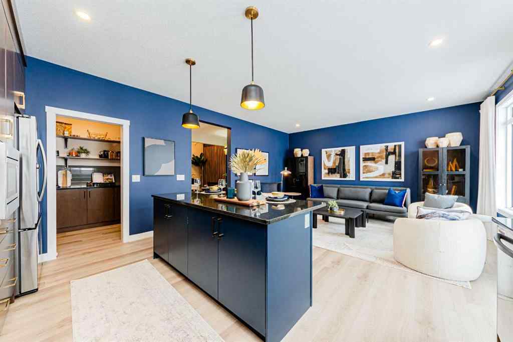 MLS® A2235359 - 711 Buffaloberry Manor SE in NONE Calgary, Residential