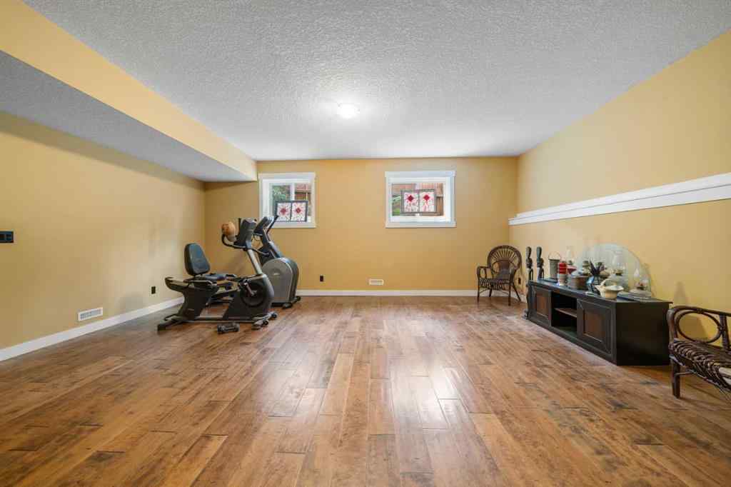 MLS® A2235390 - 118 Riverwood Crescent SW in Riverwood Estates Diamond Valley, Residential