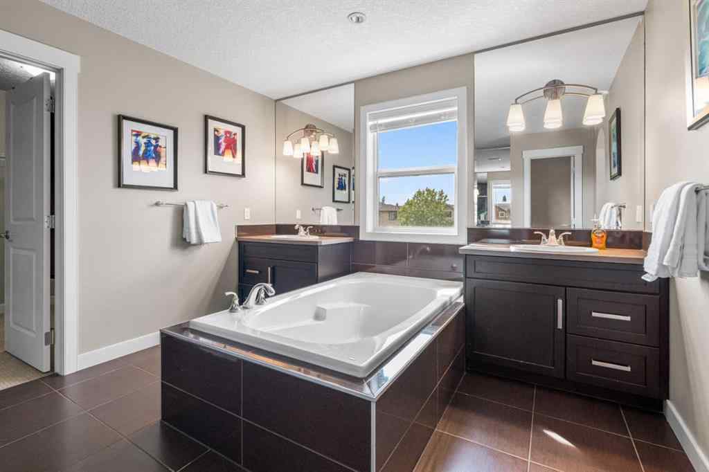 MLS® A2235404 - 156 Rainbow Falls Manor  in Rainbow Falls Chestermere, Residential
