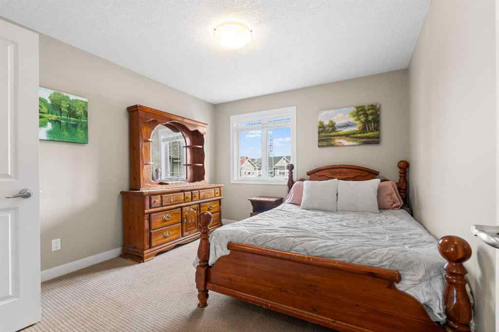 MLS® A2235404 - 156 Rainbow Falls Manor  in Rainbow Falls Chestermere, Residential