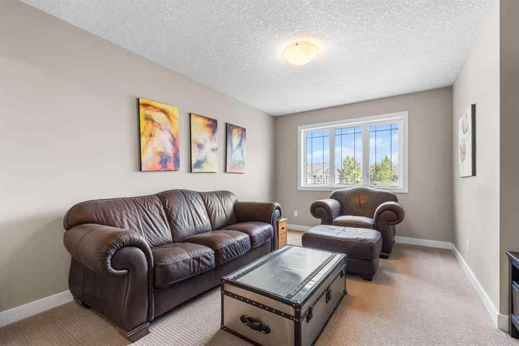 MLS® A2235404 - 156 Rainbow Falls Manor  in Rainbow Falls Chestermere, Residential