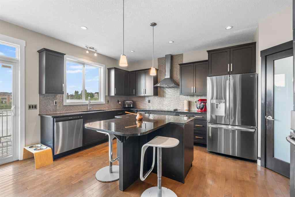 MLS® A2235404 - 156 Rainbow Falls Manor  in Rainbow Falls Chestermere, Residential