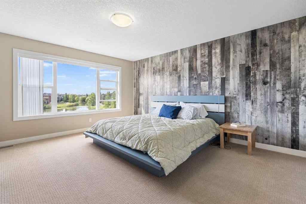MLS® A2235404 - 156 Rainbow Falls Manor  in Rainbow Falls Chestermere, Residential