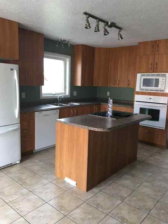 MLS® A2235420 - 10417 9 Street  in Upper West Peace Peace River, Multi-Family