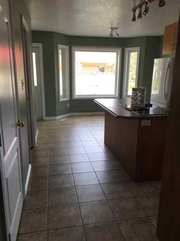 MLS® A2235420 - 10417 9 Street  in Upper West Peace Peace River, Multi-Family