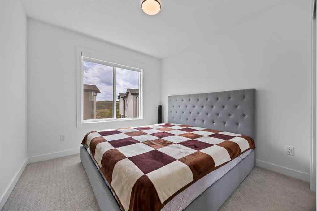 MLS® A2235439 - Unit #802 335 Creekside Boulevard SW in Pine Creek Calgary, Residential