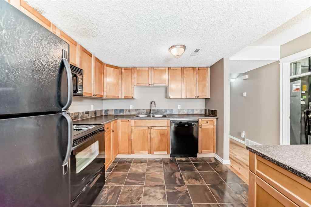 MLS® A2235477 - Unit #209 1540 29 Street NW in St Andrews Heights Calgary, Residential