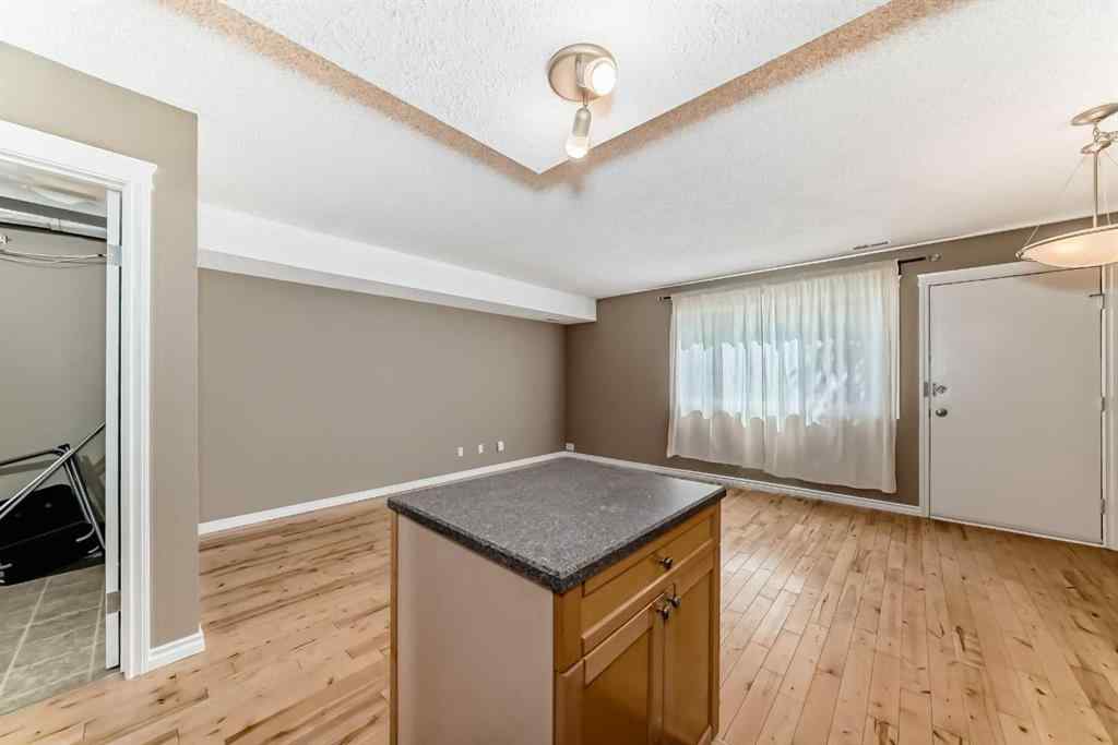 MLS® A2235477 - Unit #209 1540 29 Street NW in St Andrews Heights Calgary, Residential