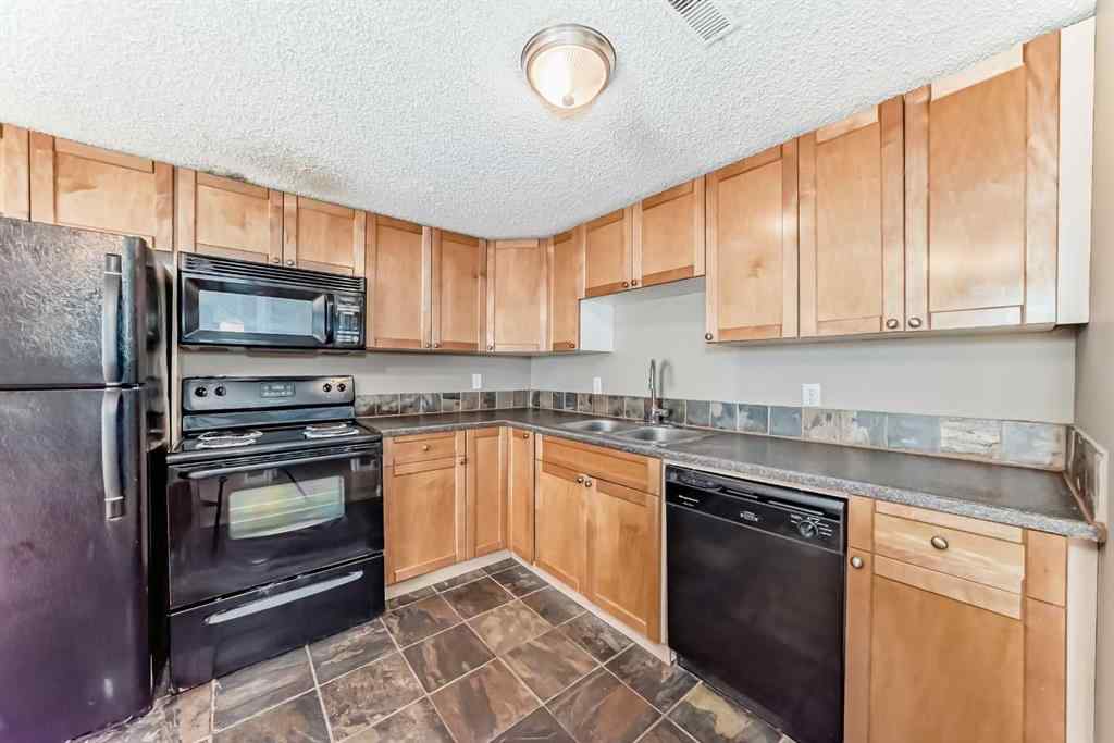 MLS® A2235477 - Unit #209 1540 29 Street NW in St Andrews Heights Calgary, Residential