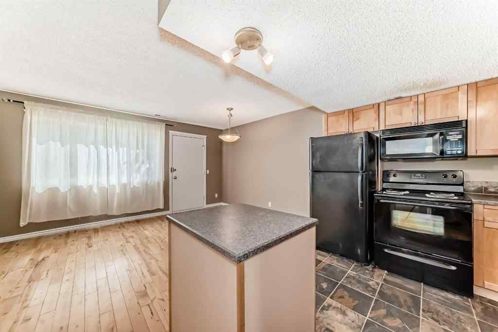 MLS® A2235477 - Unit #209 1540 29 Street NW in St Andrews Heights Calgary, Residential