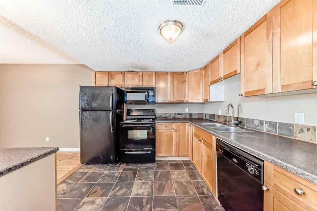 MLS® A2235477 - Unit #209 1540 29 Street NW in St Andrews Heights Calgary, Residential