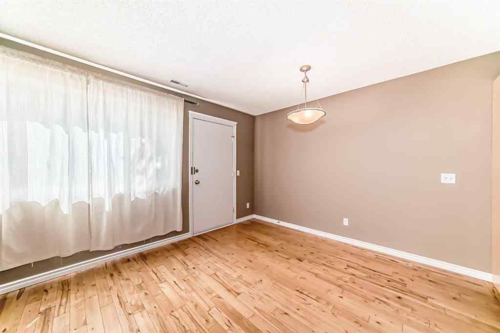 MLS® A2235477 - Unit #209 1540 29 Street NW in St Andrews Heights Calgary, Residential