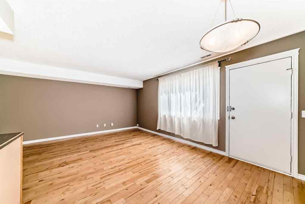 MLS® A2235477 - Unit #209 1540 29 Street NW in St Andrews Heights Calgary, Residential