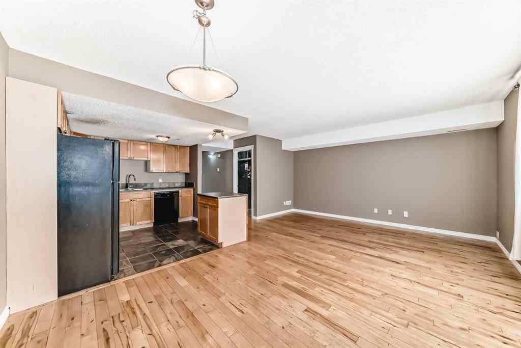 MLS® A2235477 - Unit #209 1540 29 Street NW in St Andrews Heights Calgary, Residential