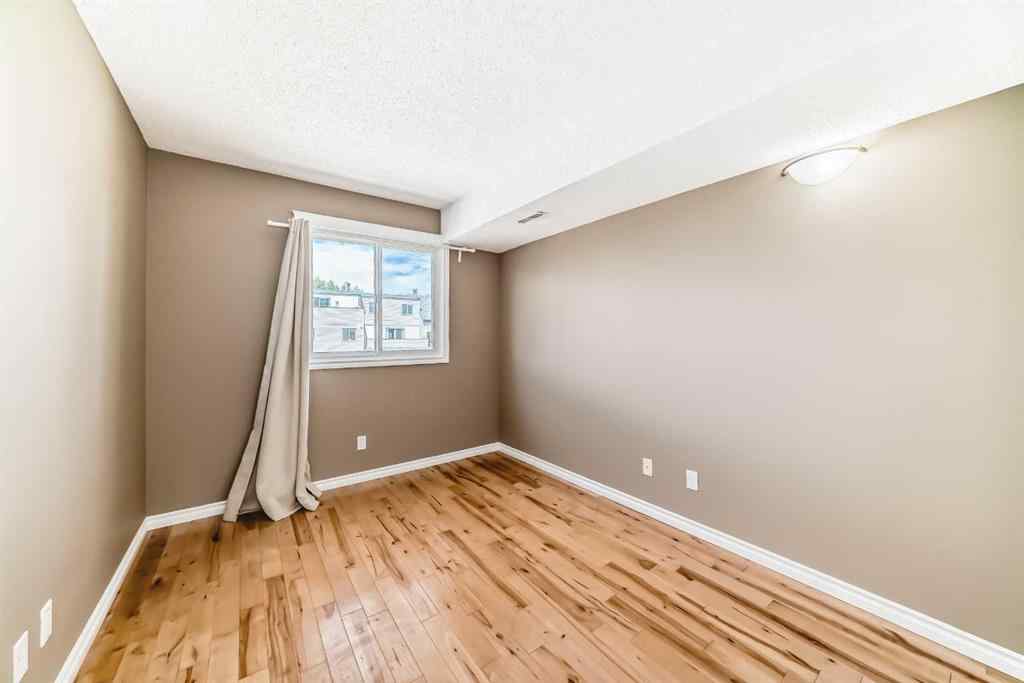 MLS® A2235477 - Unit #209 1540 29 Street NW in St Andrews Heights Calgary, Residential