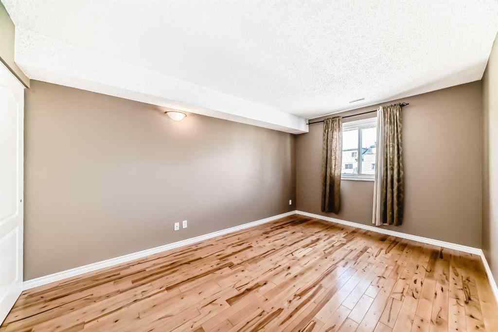 MLS® A2235477 - Unit #209 1540 29 Street NW in St Andrews Heights Calgary, Residential