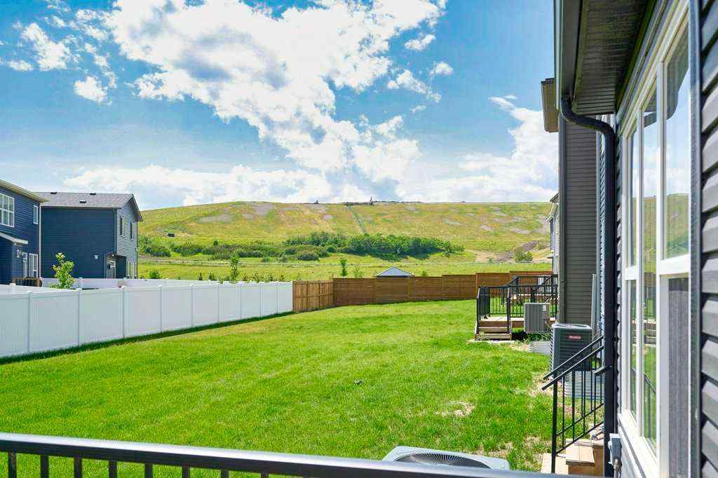 MLS® A2235509 - 103 Wolf Creek Rise SE in Wolf Willow Calgary, Residential