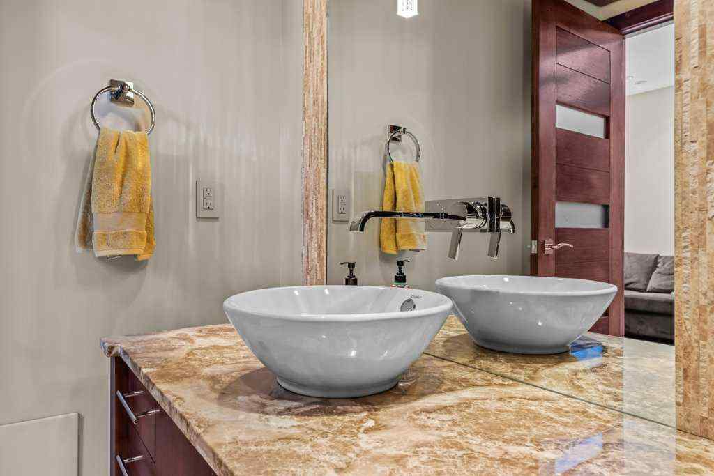 MLS® A2235511 - Unit #101 101G Stewart Creek Rise  in Three Sisters Canmore, Residential