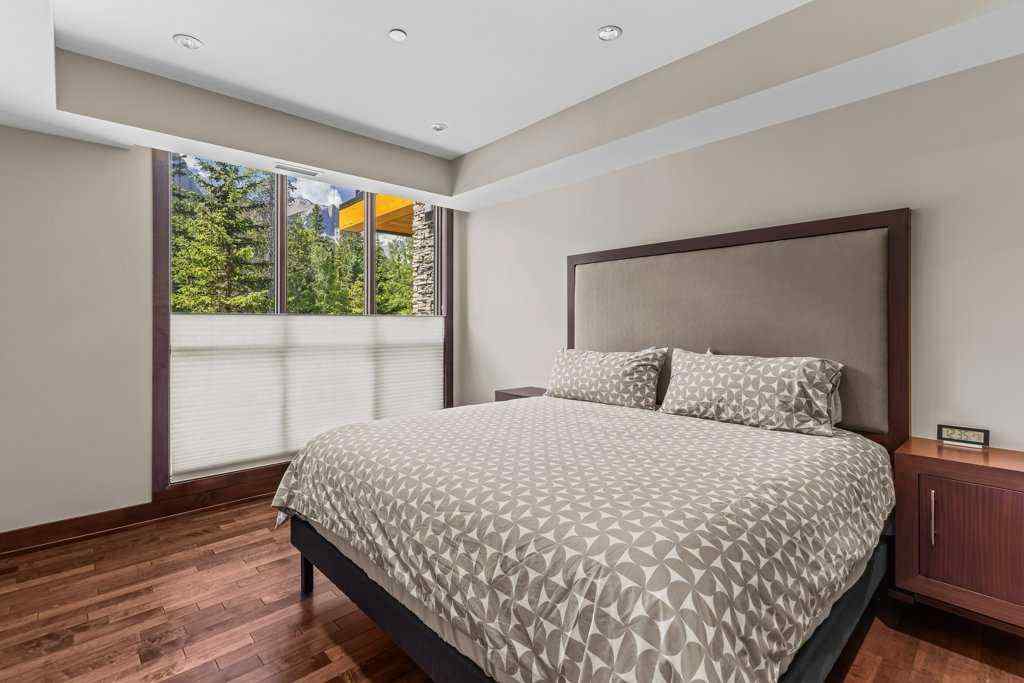 MLS® A2235511 - Unit #101 101G Stewart Creek Rise  in Three Sisters Canmore, Residential