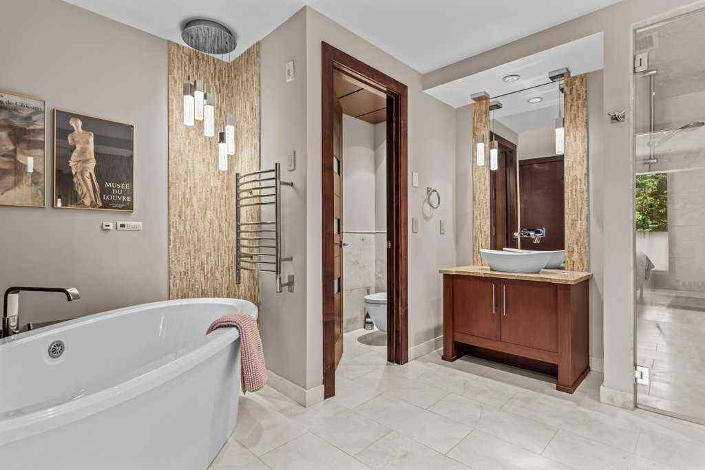 MLS® A2235511 - Unit #101 101G Stewart Creek Rise  in Three Sisters Canmore, Residential