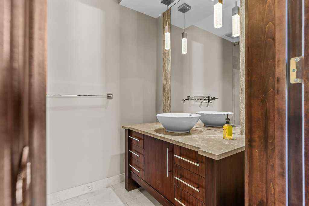 MLS® A2235511 - Unit #101 101G Stewart Creek Rise  in Three Sisters Canmore, Residential
