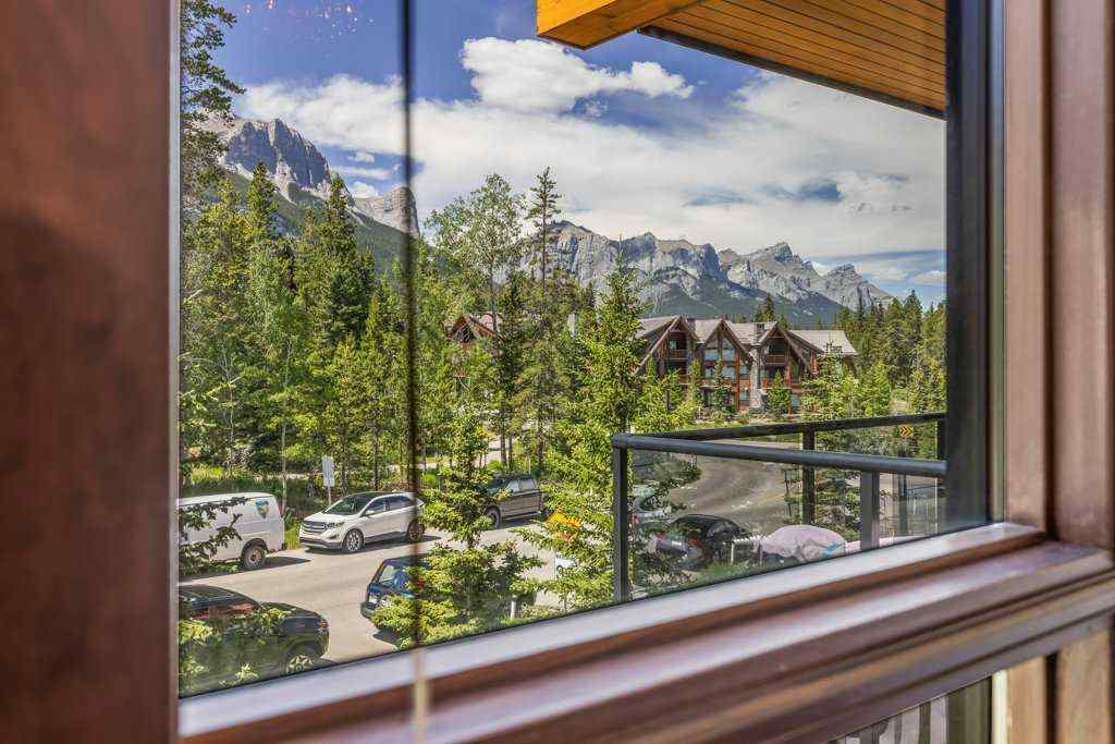 MLS® A2235511 - Unit #101 101G Stewart Creek Rise  in Three Sisters Canmore, Residential