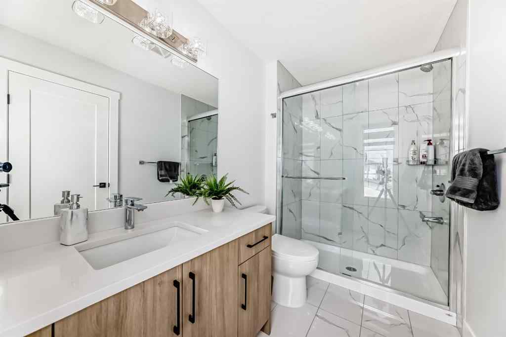 MLS® A2235594 - 127 Saddlecrest Grove NE in Saddle Ridge Calgary, Residential