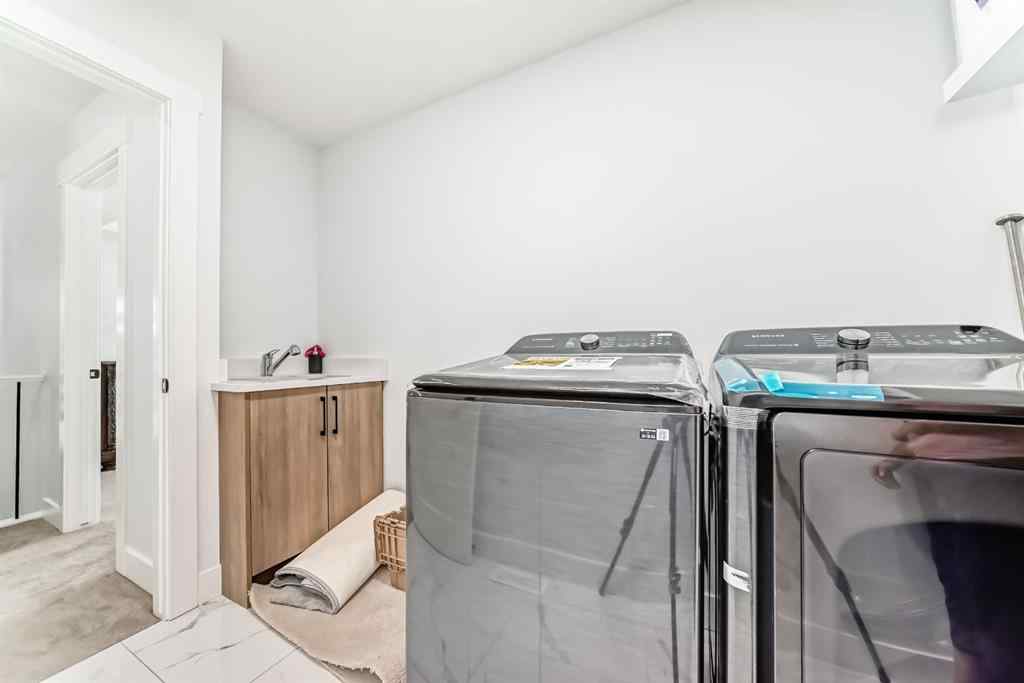 MLS® A2235594 - 127 Saddlecrest Grove NE in Saddle Ridge Calgary, Residential