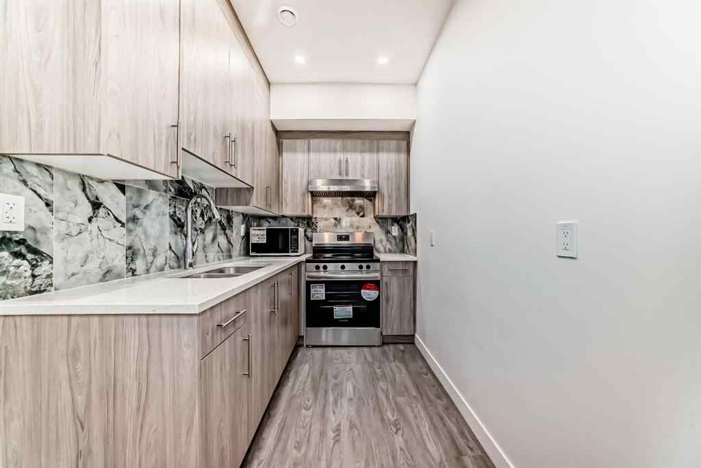 MLS® A2235594 - 127 Saddlecrest Grove NE in Saddle Ridge Calgary, Residential