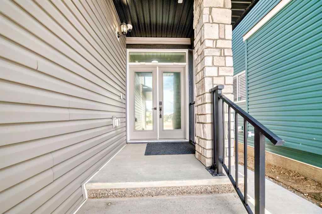 MLS® A2235594 - 127 Saddlecrest Grove NE in Saddle Ridge Calgary, Residential