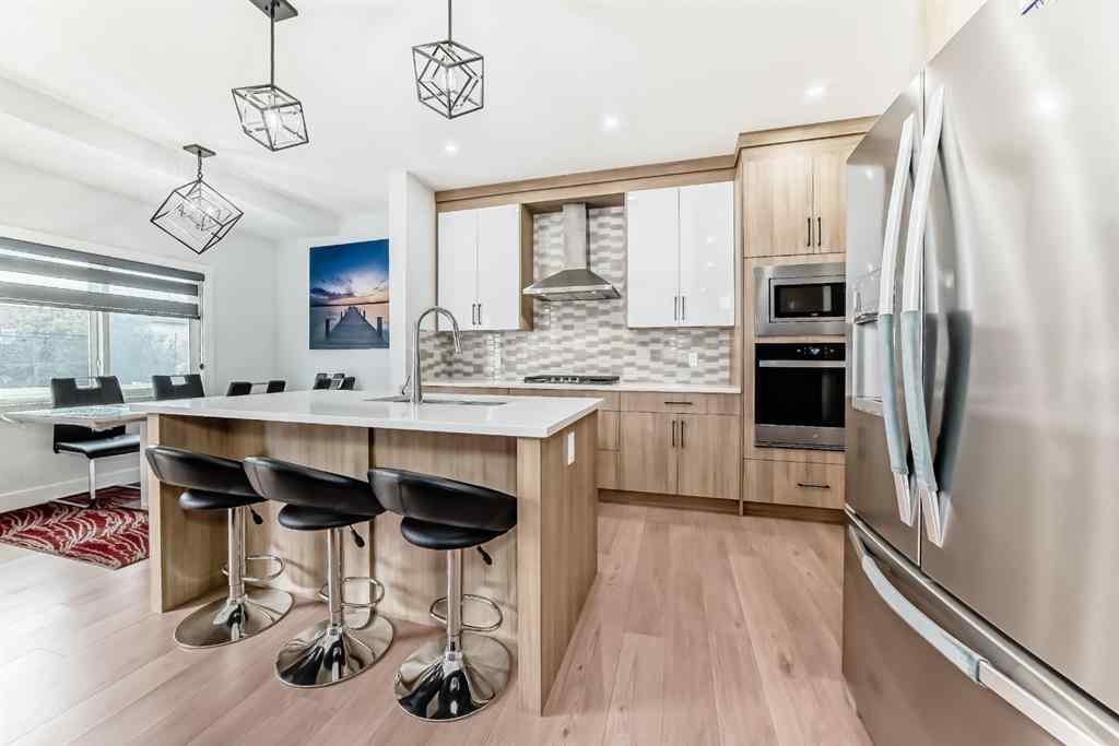 MLS® A2235594 - 127 Saddlecrest Grove NE in Saddle Ridge Calgary, Residential