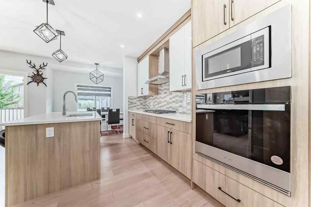 MLS® A2235594 - 127 Saddlecrest Grove NE in Saddle Ridge Calgary, Residential