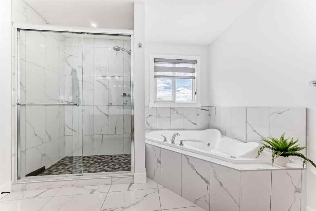 MLS® A2235594 - 127 Saddlecrest Grove NE in Saddle Ridge Calgary, Residential
