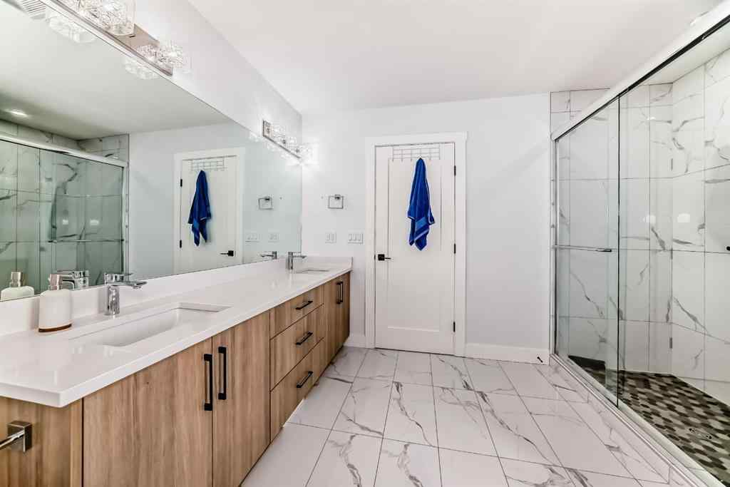 MLS® A2235594 - 127 Saddlecrest Grove NE in Saddle Ridge Calgary, Residential