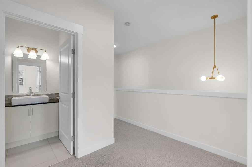 MLS® A2235595 - 78 West Coach Manor SW in West Springs Calgary, Residential