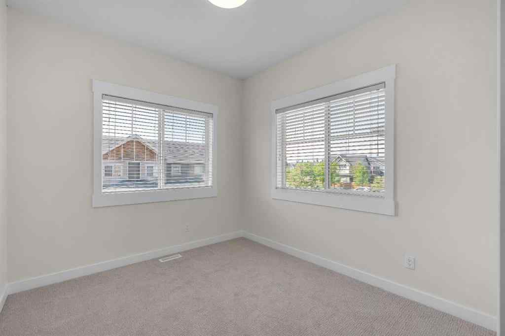 MLS® A2235595 - 78 West Coach Manor SW in West Springs Calgary, Residential