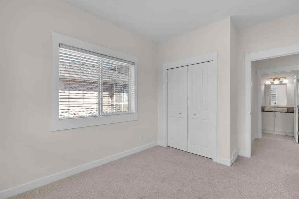 MLS® A2235595 - 78 West Coach Manor SW in West Springs Calgary, Residential