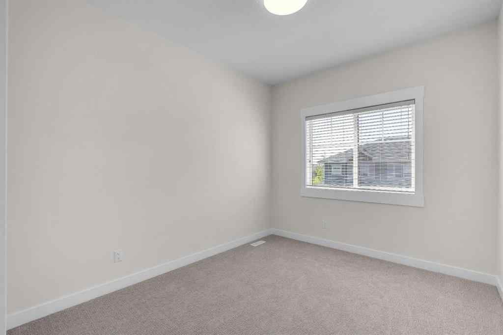 MLS® A2235595 - 78 West Coach Manor SW in West Springs Calgary, Residential