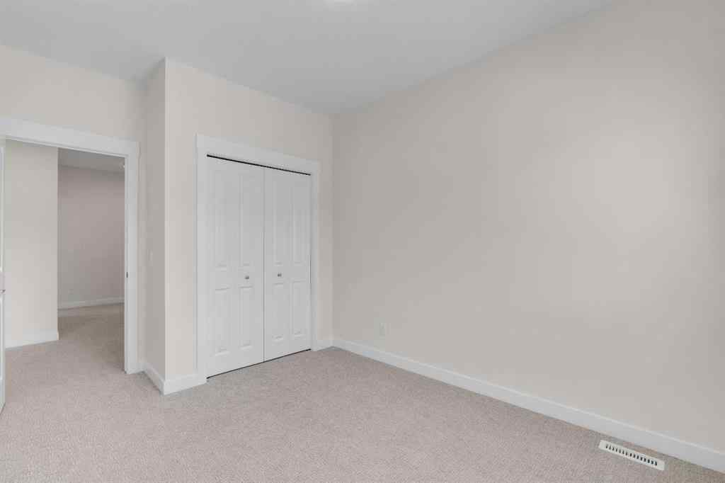 MLS® A2235595 - 78 West Coach Manor SW in West Springs Calgary, Residential