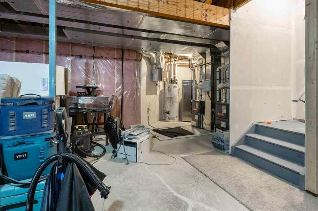 MLS® A2235640 - 890 Bluerock Way SW in Alpine Park Calgary, Residential