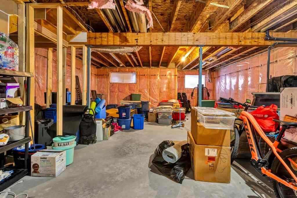 MLS® A2235640 - 890 Bluerock Way SW in Alpine Park Calgary, Residential