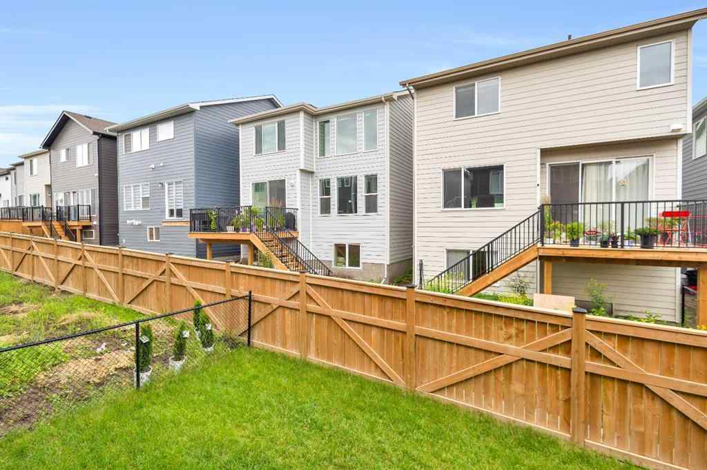 MLS® A2235640 - 890 Bluerock Way SW in Alpine Park Calgary, Residential