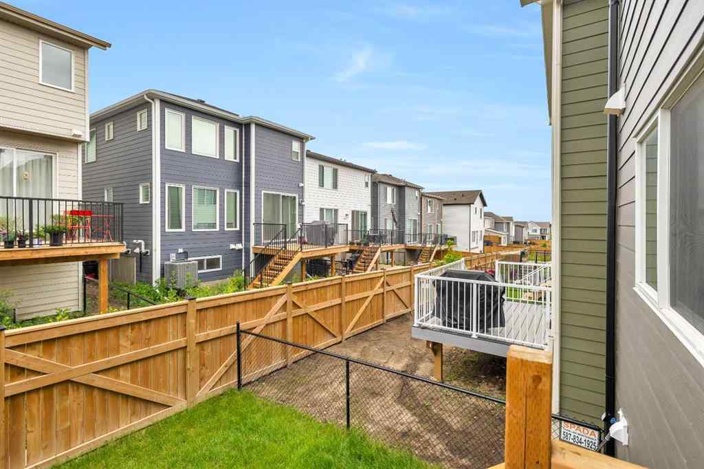 MLS® A2235640 - 890 Bluerock Way SW in Alpine Park Calgary, Residential