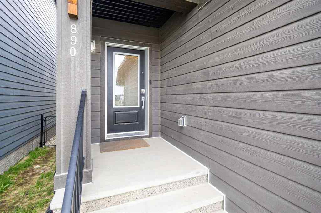 MLS® A2235640 - 890 Bluerock Way SW in Alpine Park Calgary, Residential
