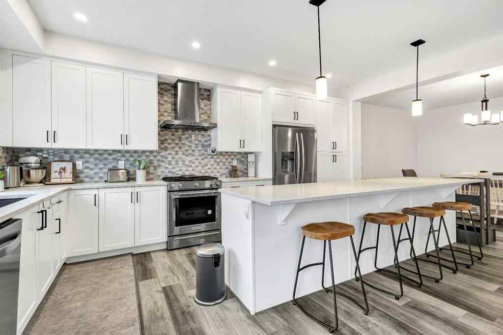 MLS® A2235640 - 890 Bluerock Way SW in Alpine Park Calgary, Residential